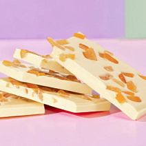 Белый шоколад с цукатами апельсиновых корочек (ломаный)